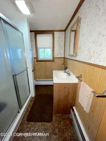 a view of balcony with wooden floor and staircase