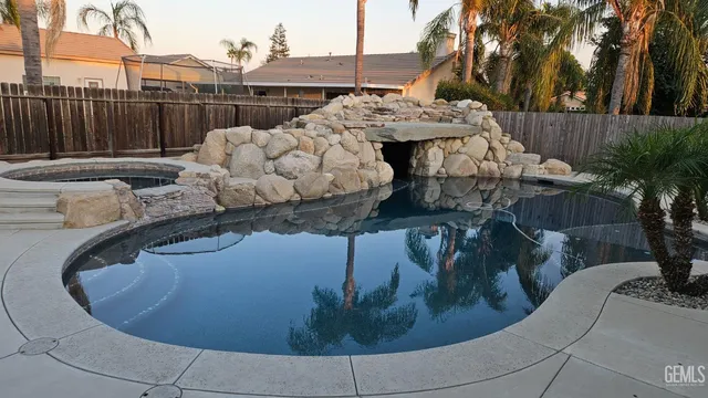 a view of a backyard of the house