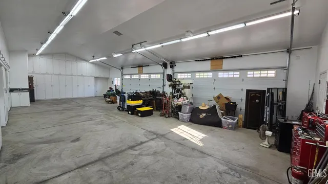 a view of an empty room and fire place