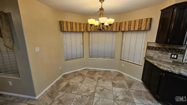 a view of a kitchen with a sink