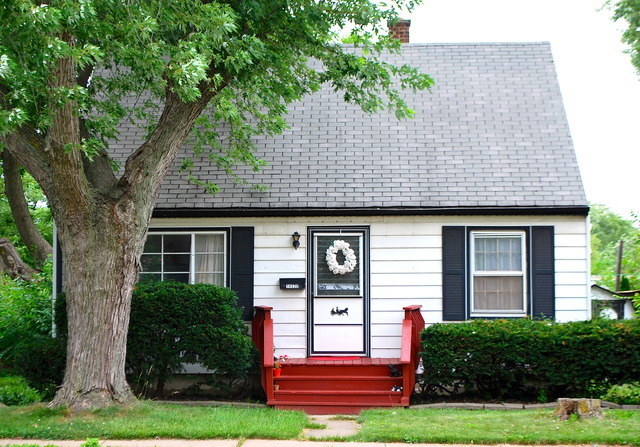 14520 Abbottsford Road Midlothian, IL 60445 - Photo 1 of 4 a front view of a house with garden