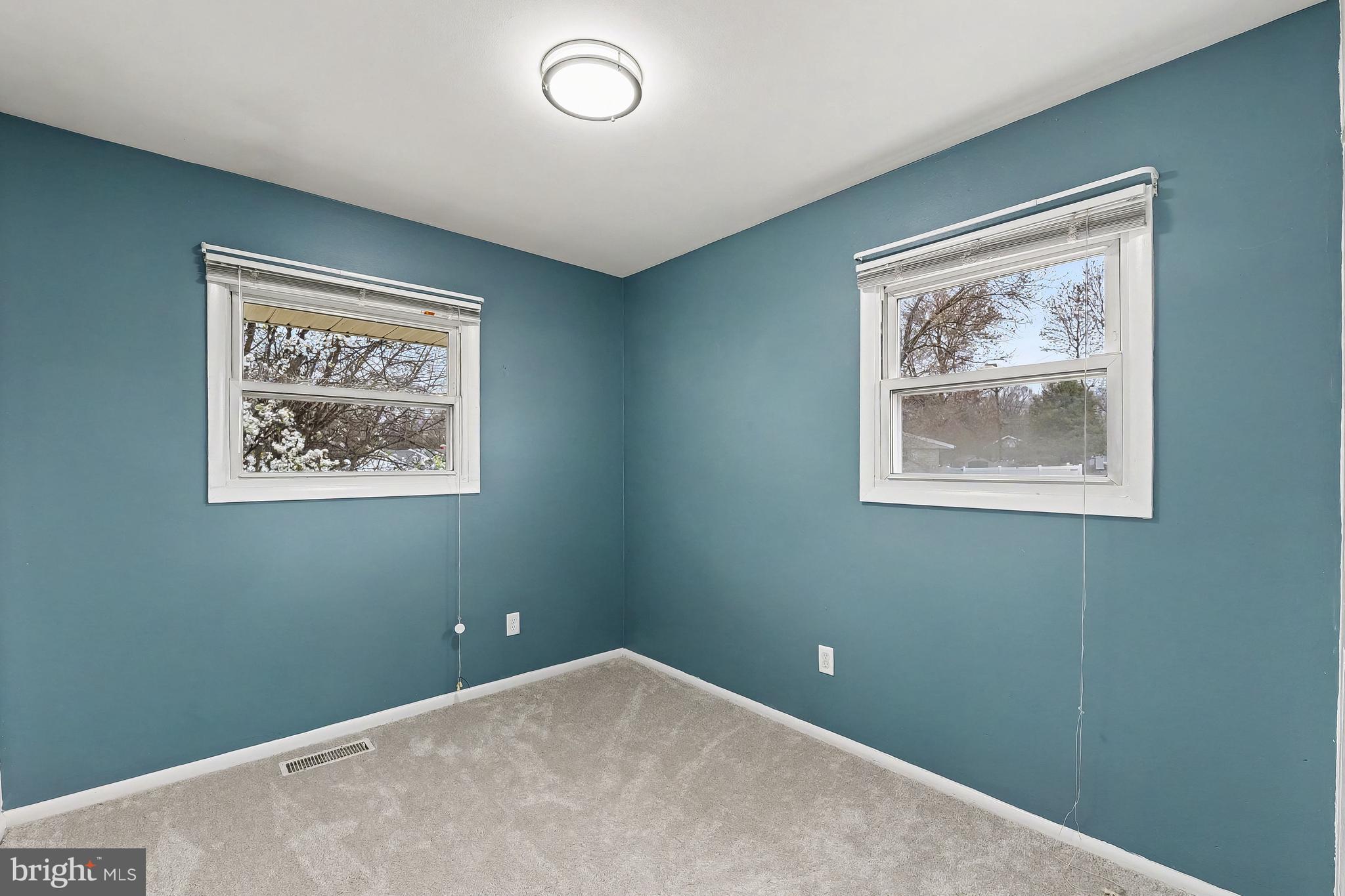 2309 Perry Avenue Edgewood, MD 21040 - Photo 15 of 25 an empty room with wall painting and a window