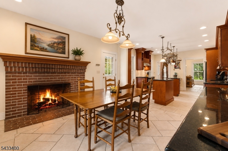 61 New Street Hampton, NJ 08827 - Photo 7 of 45 a dining room with furniture and a fireplace
