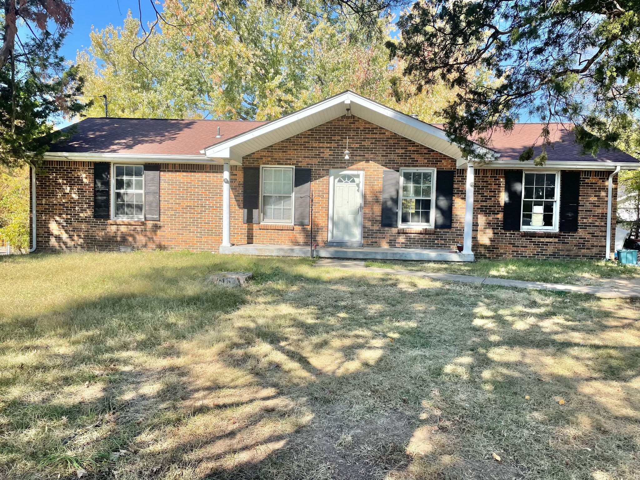 813 Ringgold Road Clarksville, TN 37042 - Photo 1 of 4 a front view of a house with a yard