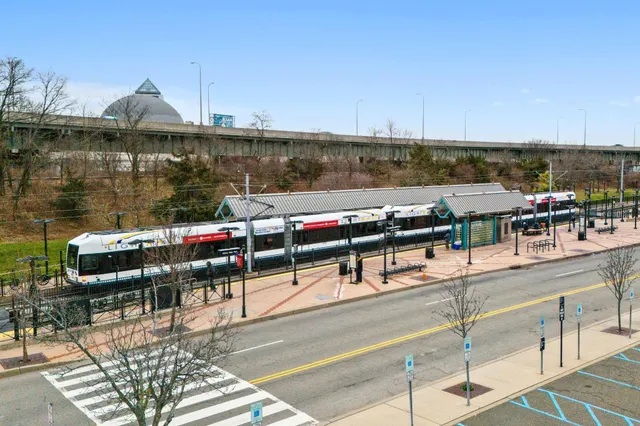 a terrace with outdoor seating and city view