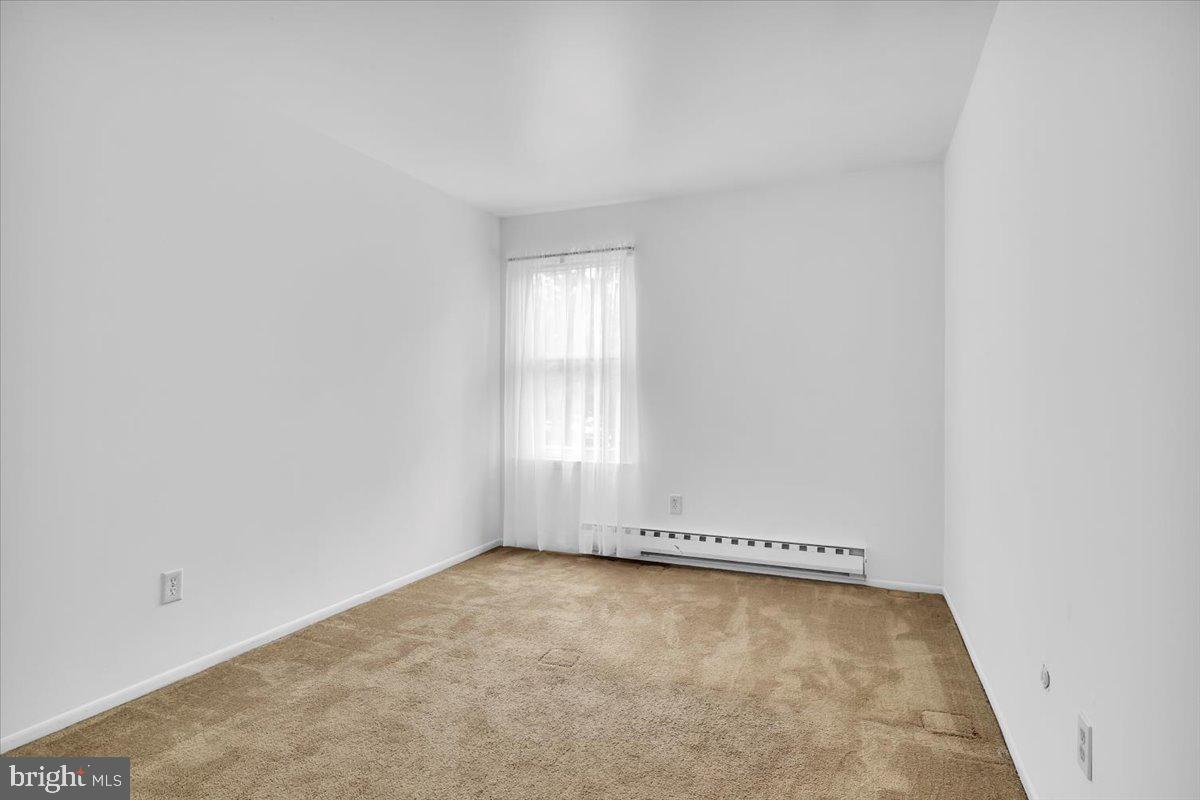 1105 Bromley Estate Pine Hill, NJ 08021 - Photo 11 of 27 an empty room with a window