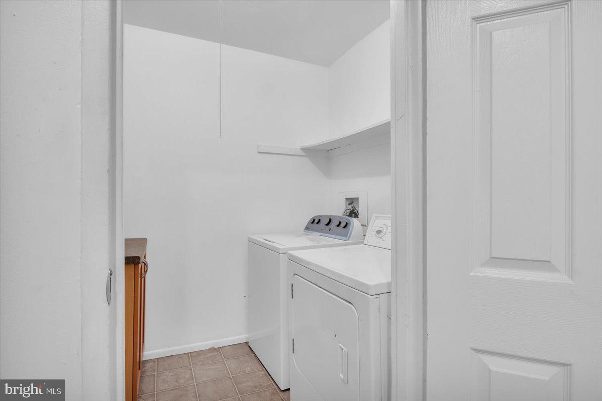 1105 Bromley Estate Pine Hill, NJ 08021 - Photo 16 of 27 a utility room with dryer and washer