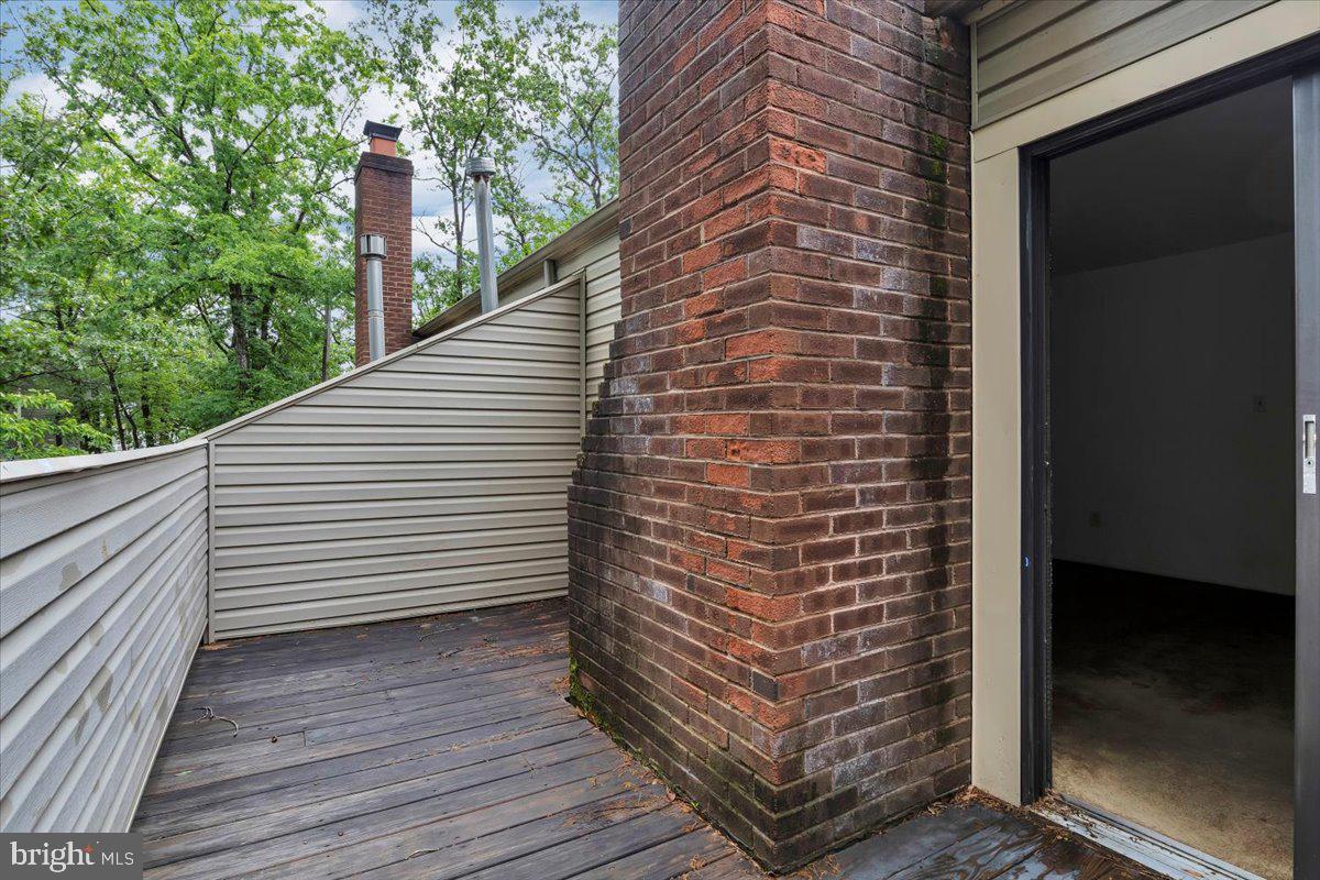 1105 Bromley Estate Pine Hill, NJ 08021 - Photo 19 of 27 a view of a balcony with wooden floor