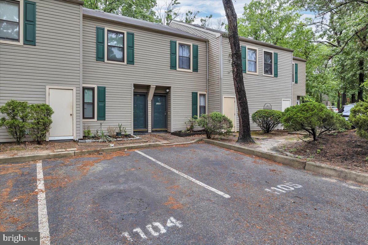 1105 Bromley Estate Pine Hill, NJ 08021 - Photo 25 of 27 a view of a house with a yard and plants