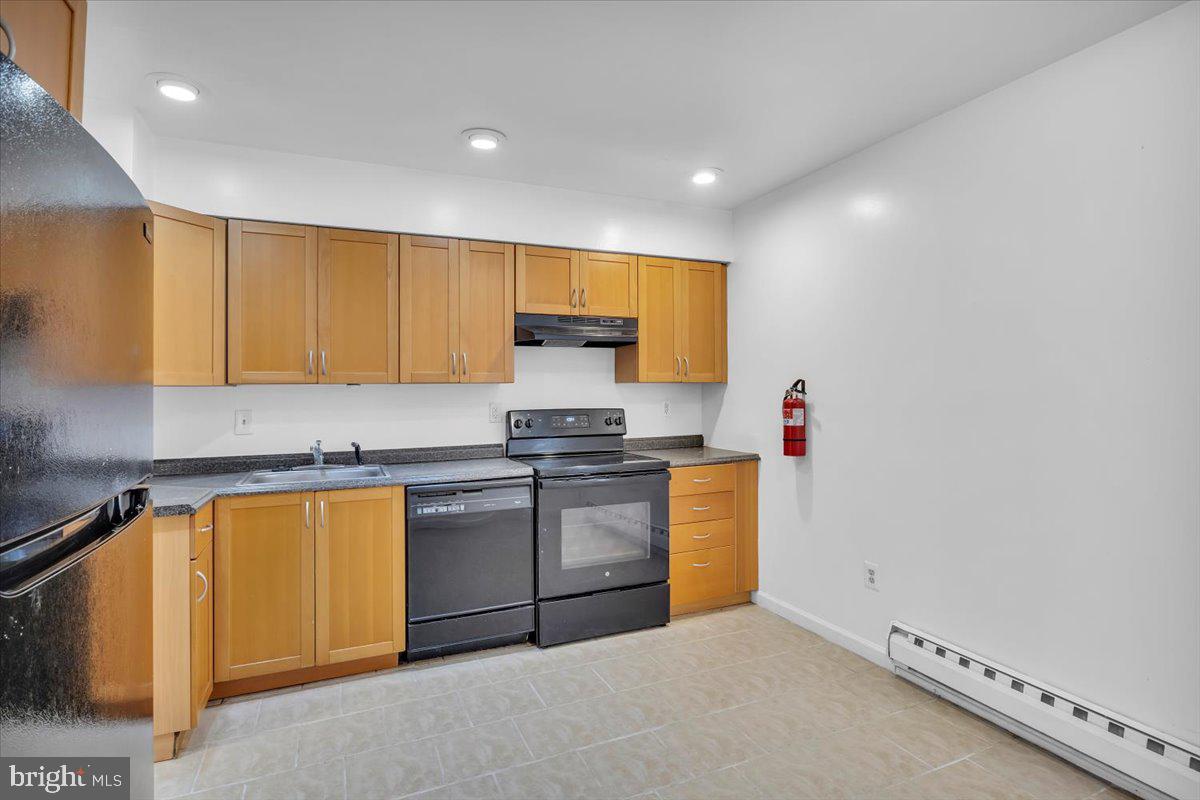 1105 Bromley Estate Pine Hill, NJ 08021 - Photo 3 of 27 a kitchen with stainless steel appliances granite countertop a stove a sink and a refrigerator
