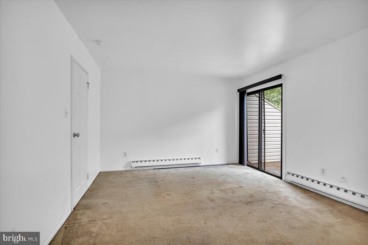 1105 Bromley Estate Pine Hill, NJ 08021 - Photo 7 of 27 an empty room with a window