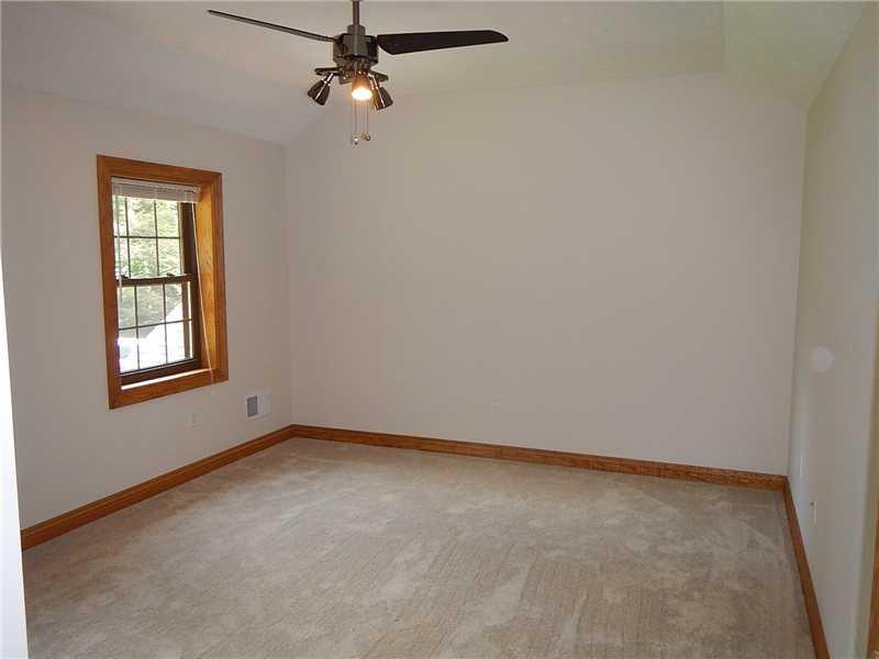 105 Eckstein Road Renfrew, PA 16053 - Photo 16 of 25 Bedroom. The third bedroom features new carpeting, fresh paint, 2 windows, and a ceiling fan.