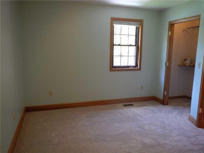 105 Eckstein Road Renfrew, PA 16053 - Photo 18 of 25 Bedroom. The fourth bedroom has fresh paint, new carpet, and a ceiling fan.
