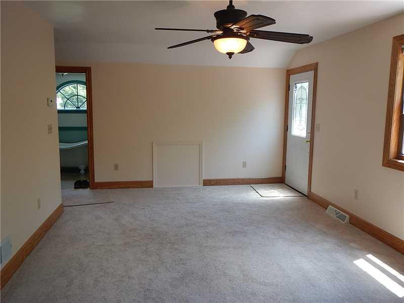 105 Eckstein Road Renfrew, PA 16053 - Photo 9 of 25 Master Bedroom. Master suite or mother-in-law suite with separate entrance. This room features new carpet, fresh paint, ceiling fan and a large closet.