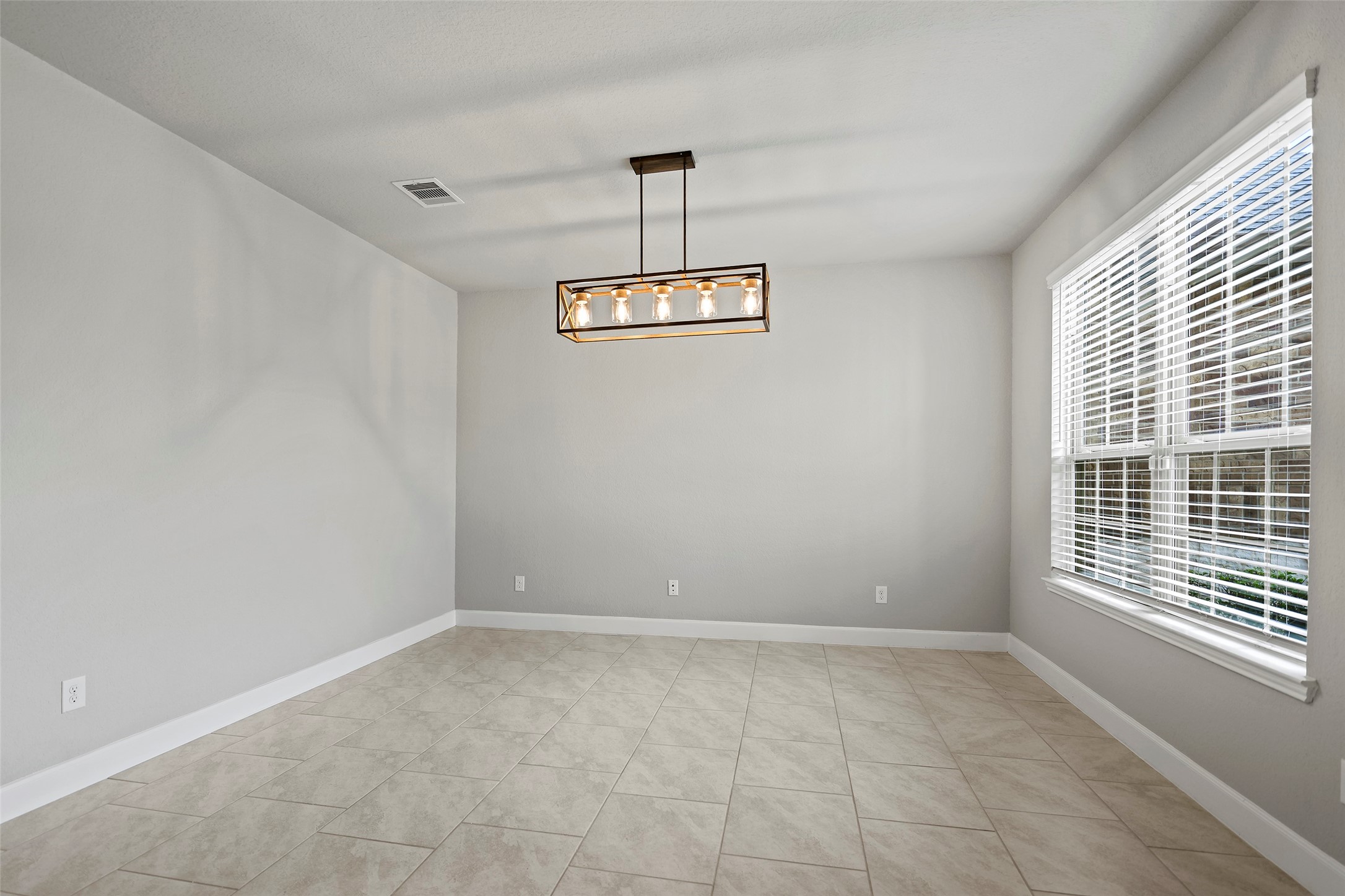 5839 Metaphor Way Rosenberg, TX 77469 - Photo 18 of 50 Dedicated Dining Room for the memorable holiday dinners.