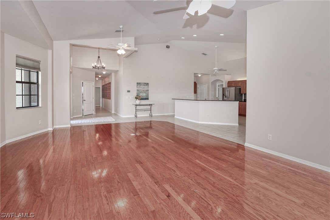 17501 Homewood Road Fort Myers, FL 33967 - Photo 12 of 50 a view of a big room with wooden floor and windows