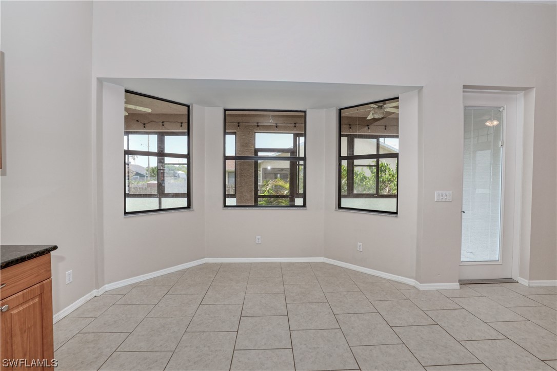 17501 Homewood Road Fort Myers, FL 33967 - Photo 22 of 50 an empty room with windows
