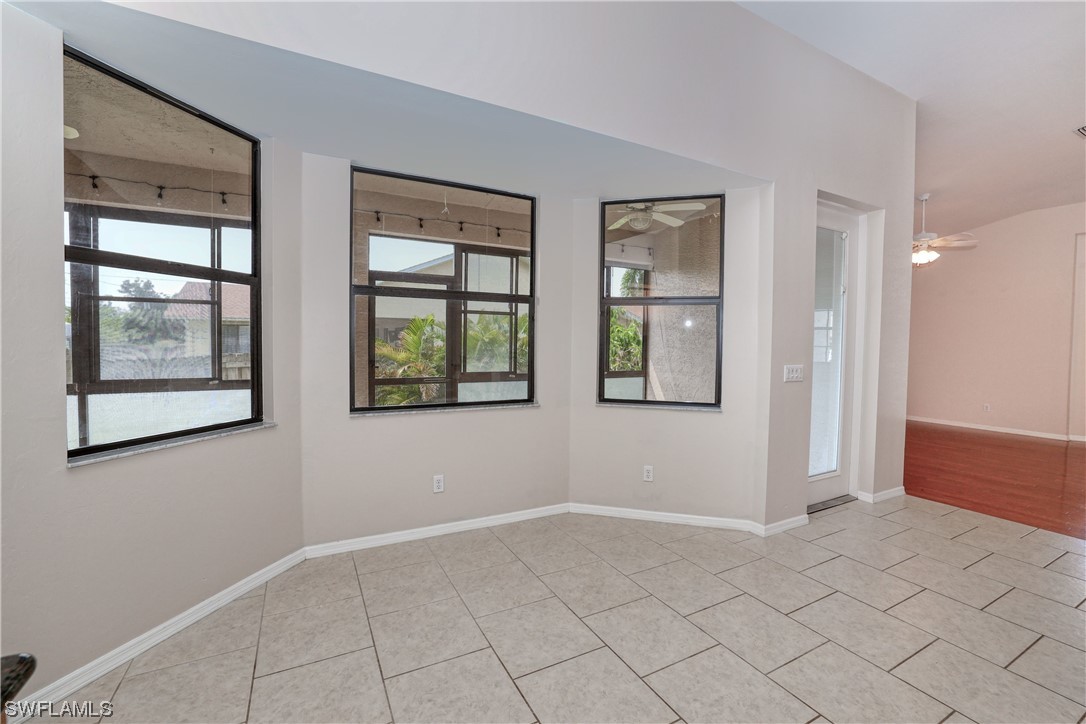 17501 Homewood Road Fort Myers, FL 33967 - Photo 23 of 50 a view of an empty room with window and cabinet