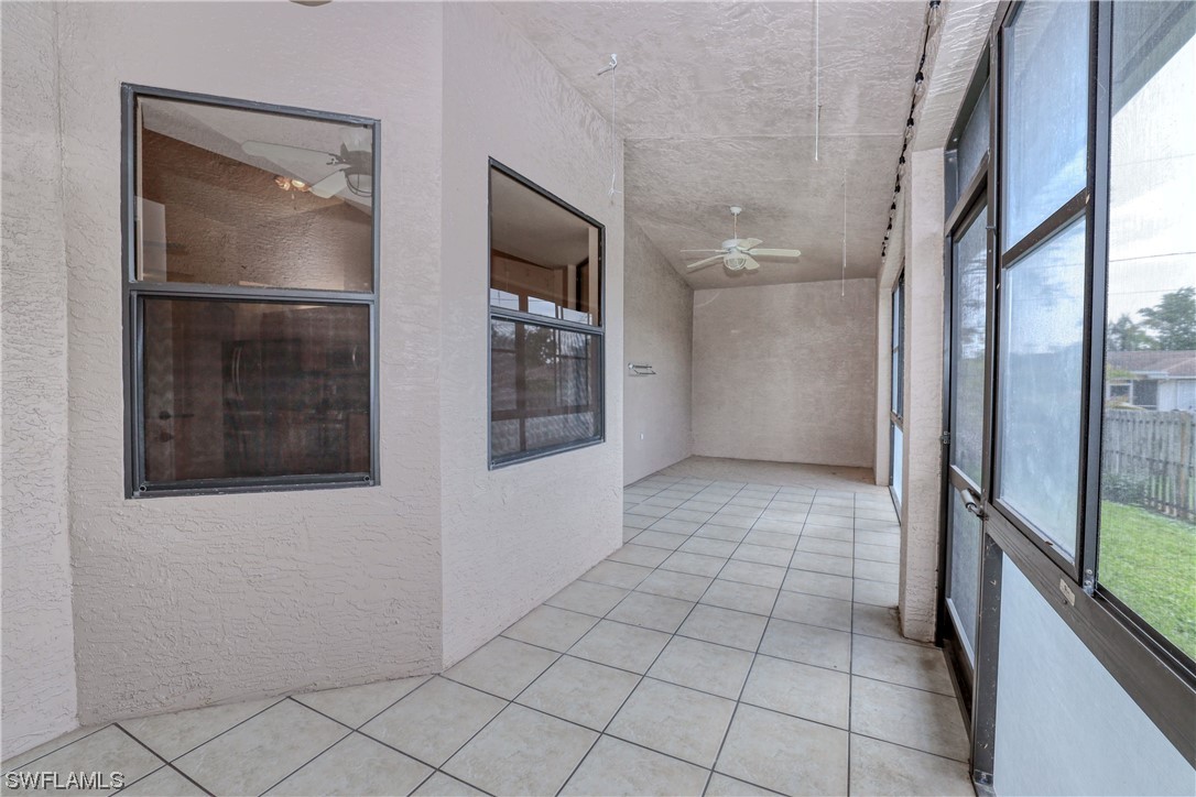 17501 Homewood Road Fort Myers, FL 33967 - Photo 25 of 50 a view of an empty room with cabinet and a window