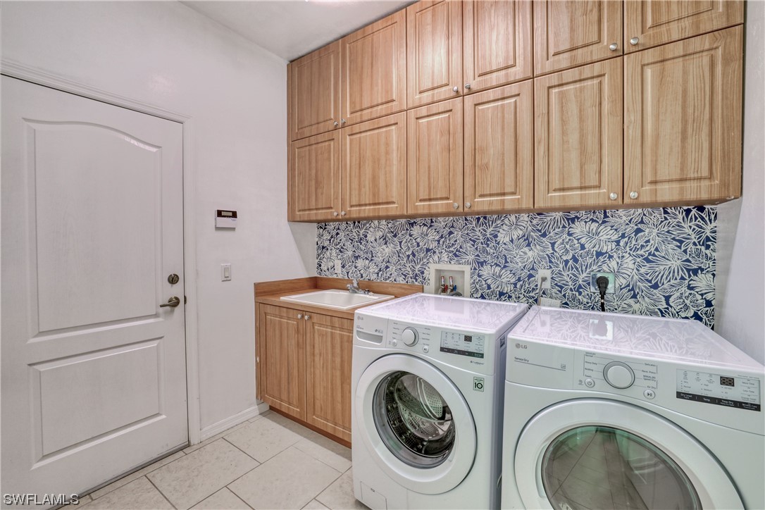 17501 Homewood Road Fort Myers, FL 33967 - Photo 29 of 50 a utility room with dryer and washer