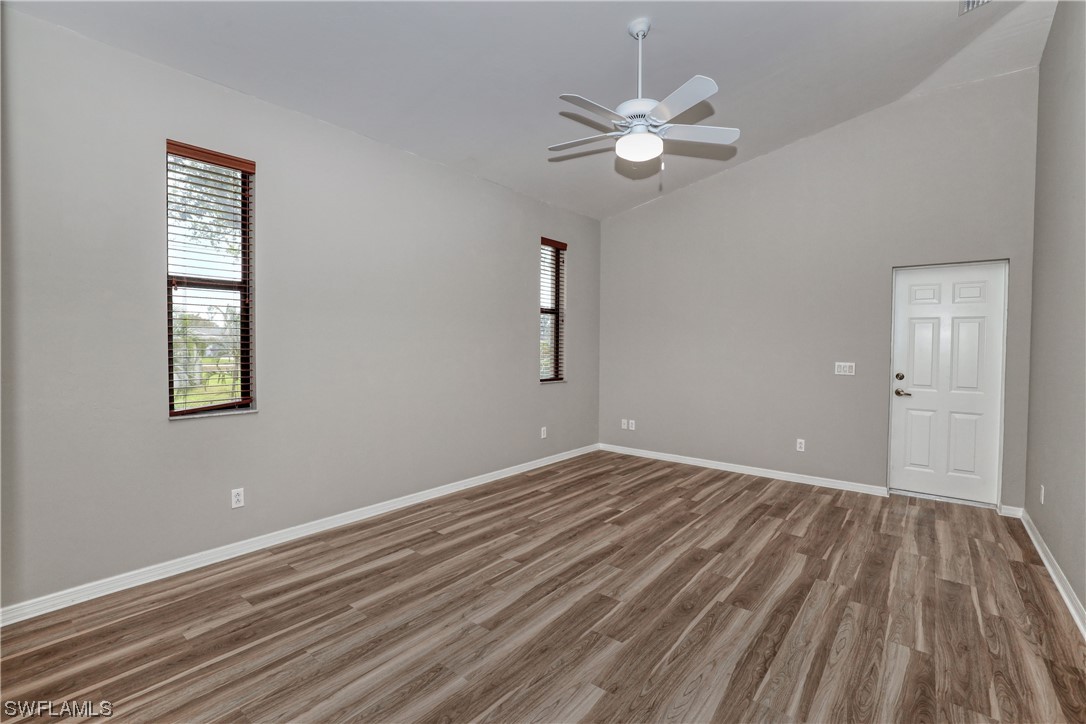 17501 Homewood Road Fort Myers, FL 33967 - Photo 35 of 50 a view of a room with wooden floor and fan