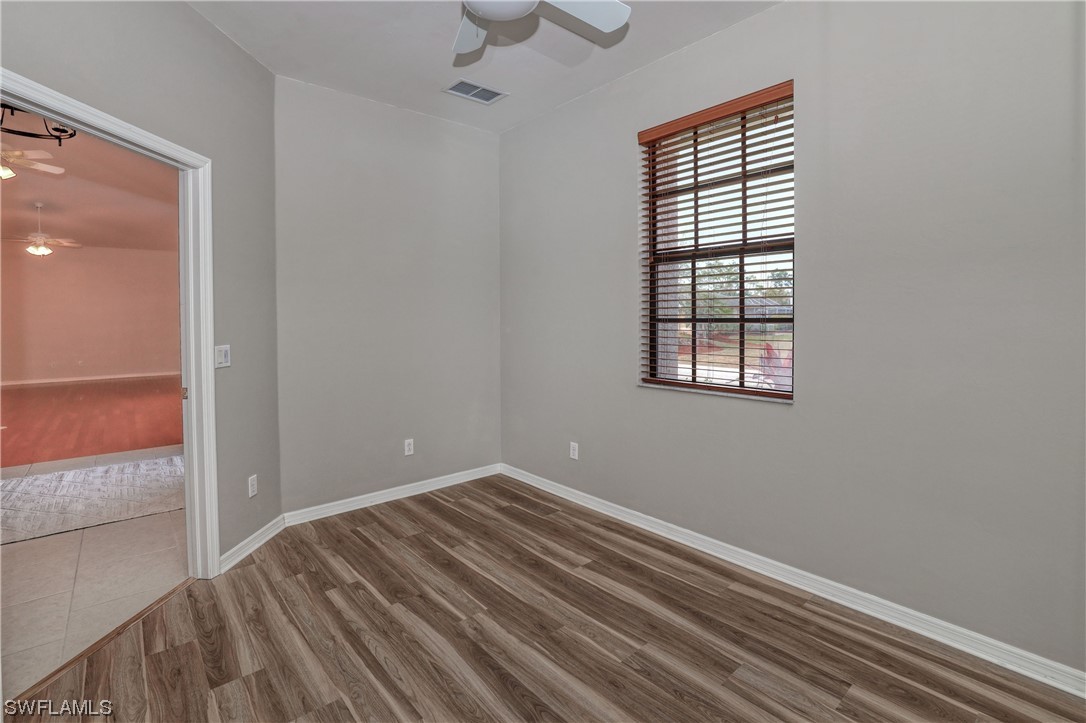 17501 Homewood Road Fort Myers, FL 33967 - Photo 43 of 50 an empty room with windows