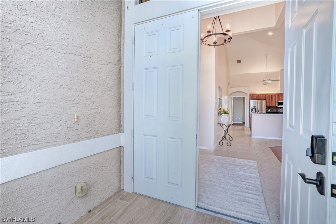 17501 Homewood Road Fort Myers, FL 33967 - Photo 7 of 50 wooden floor with white walls