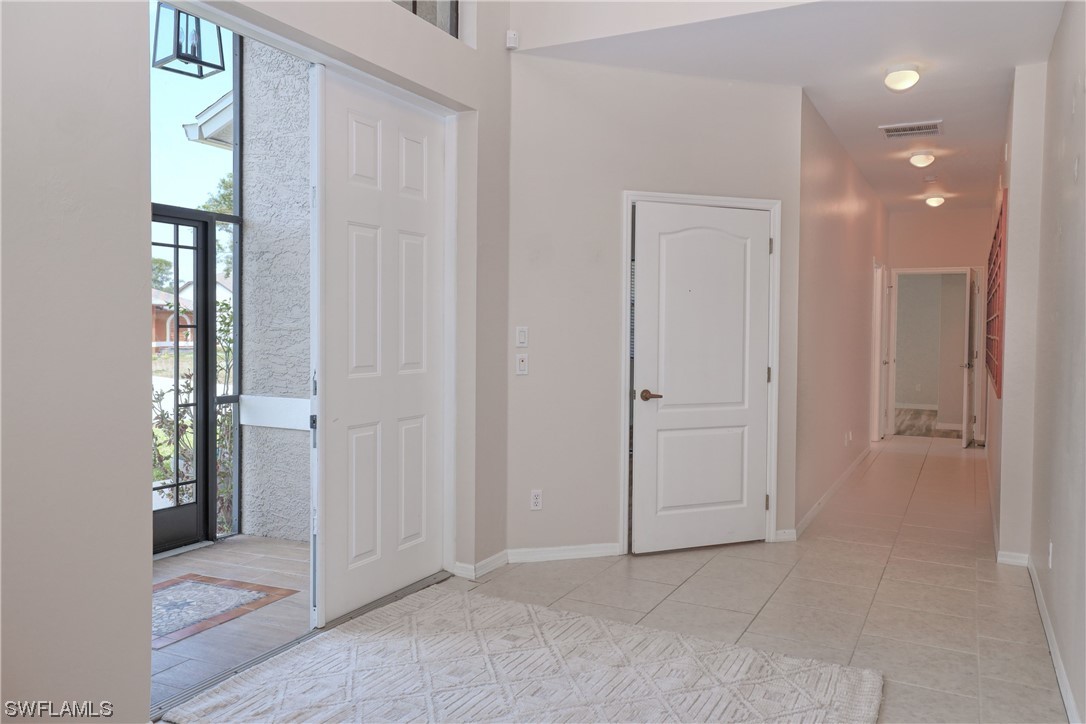 17501 Homewood Road Fort Myers, FL 33967 - Photo 9 of 50 an empty room with windows and closet