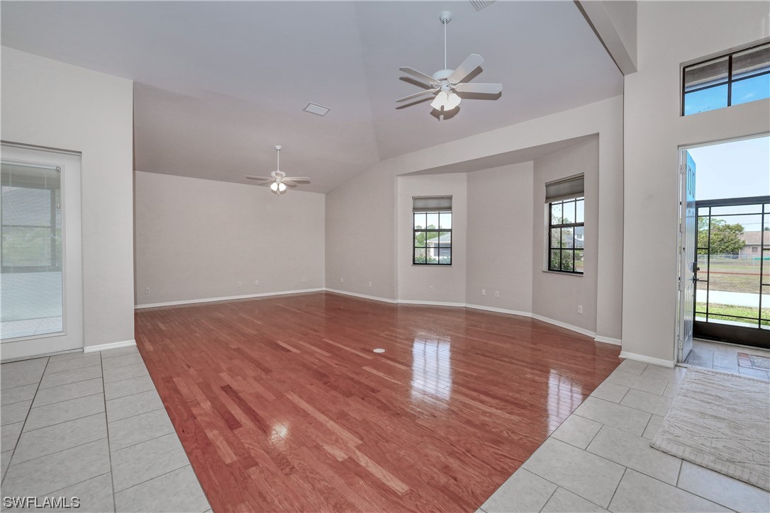 17501 Homewood Road Fort Myers, FL 33967 - Photo 10 of 50 wooden floor in an empty room with a window