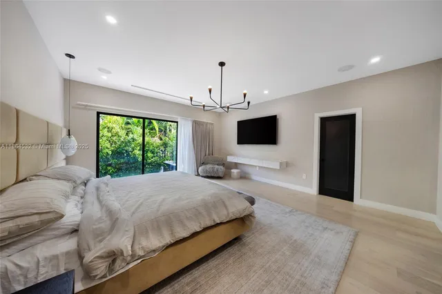 a view of a hallway with washer and dryer
