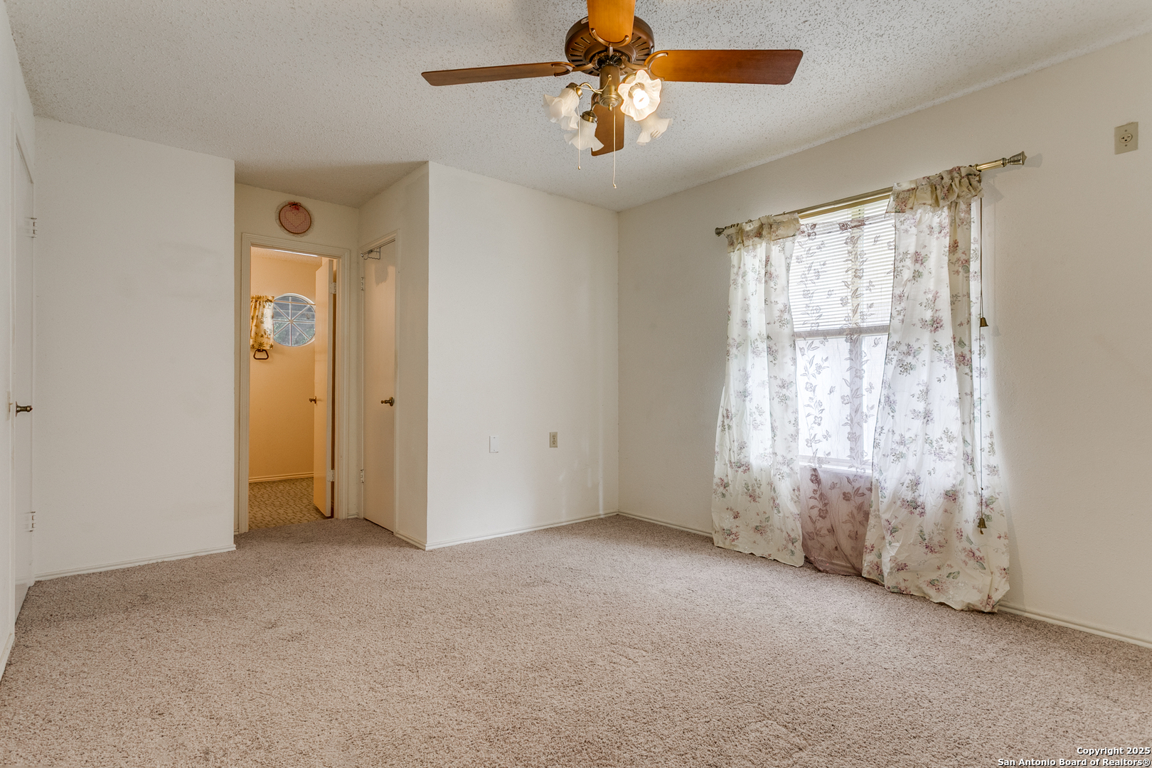 3629 Fox Run Schertz, TX 78108 - Photo 13 of 25 a view of an empty room with a window