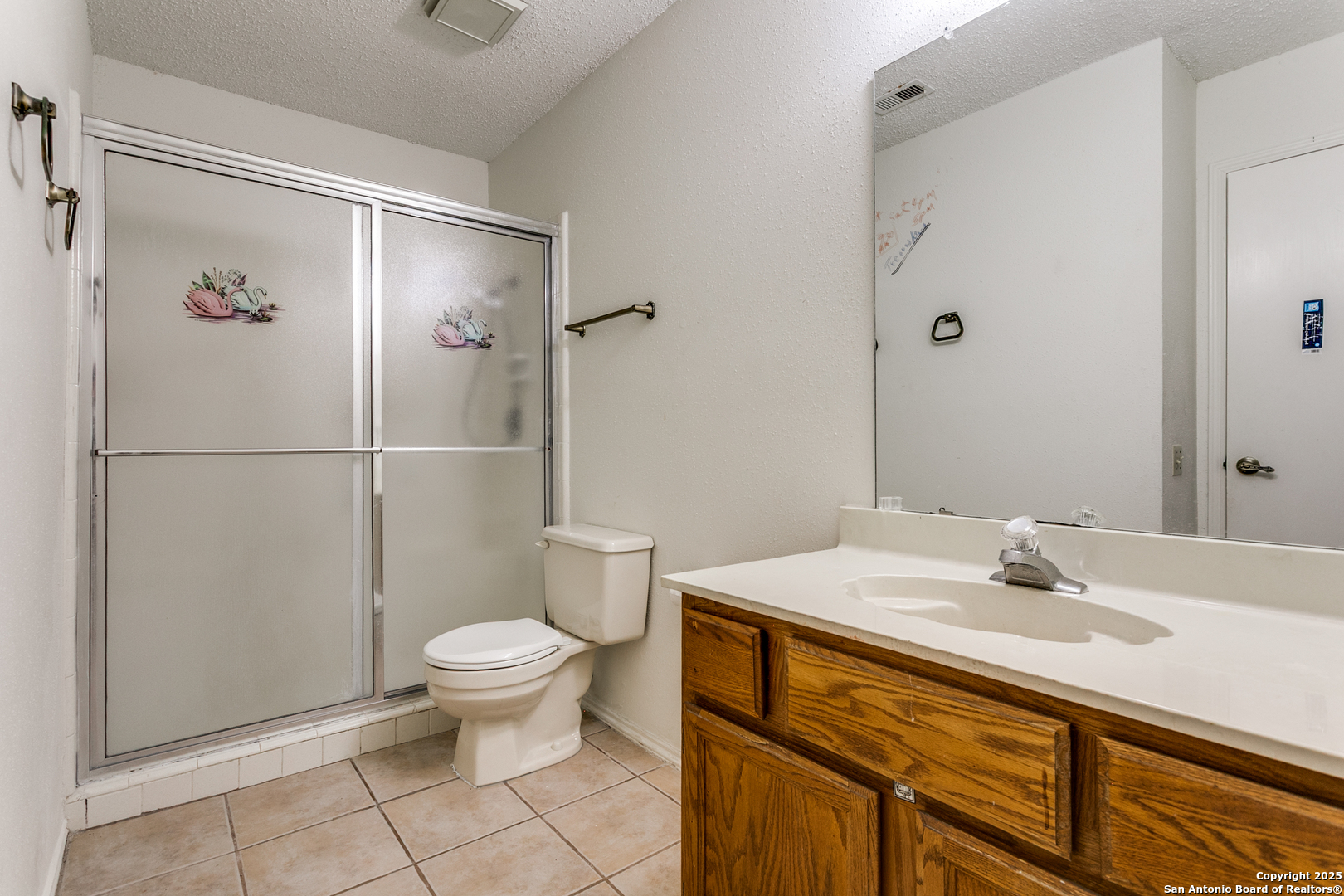 3629 Fox Run Schertz, TX 78108 - Photo 15 of 25 a bathroom with a sink toilet and shower