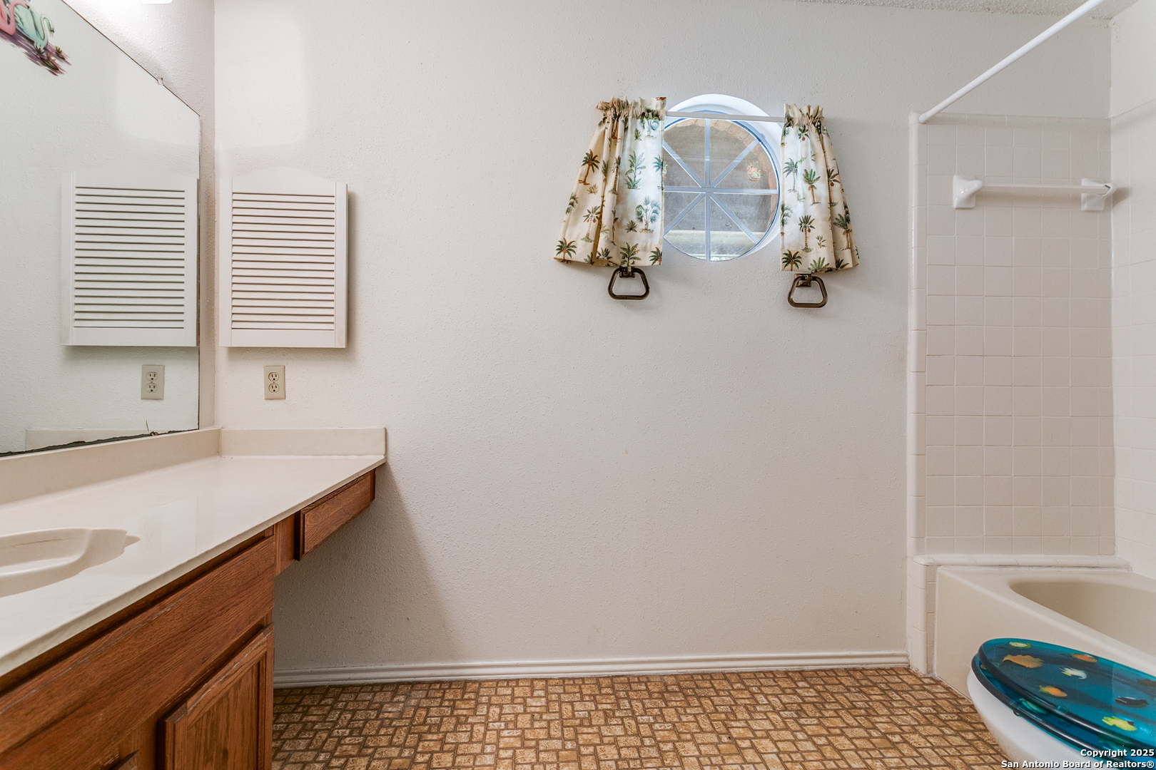 3629 Fox Run Schertz, TX 78108 - Photo 18 of 25 a bathroom with a sink and a window