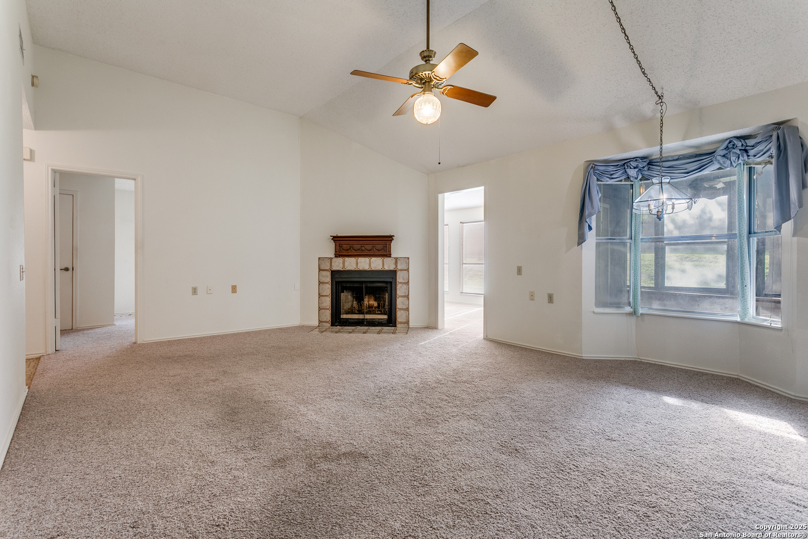 3629 Fox Run Schertz, TX 78108 - Photo 5 of 25 an empty room with windows and fan