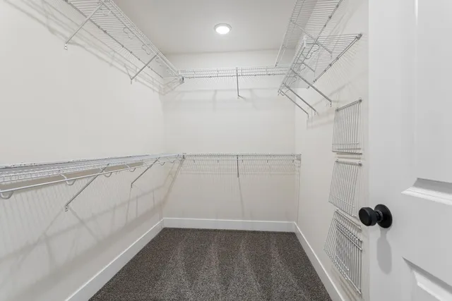 a view of a room with racks on the wall