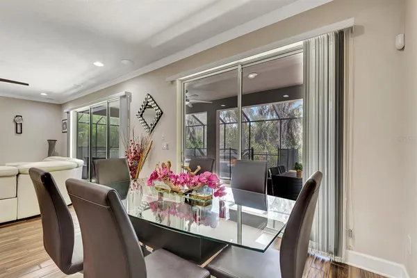 a bathroom with a double vanity sink a large mirror and shower