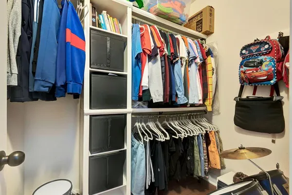 a dining room with furniture wooden floor and a potted plant