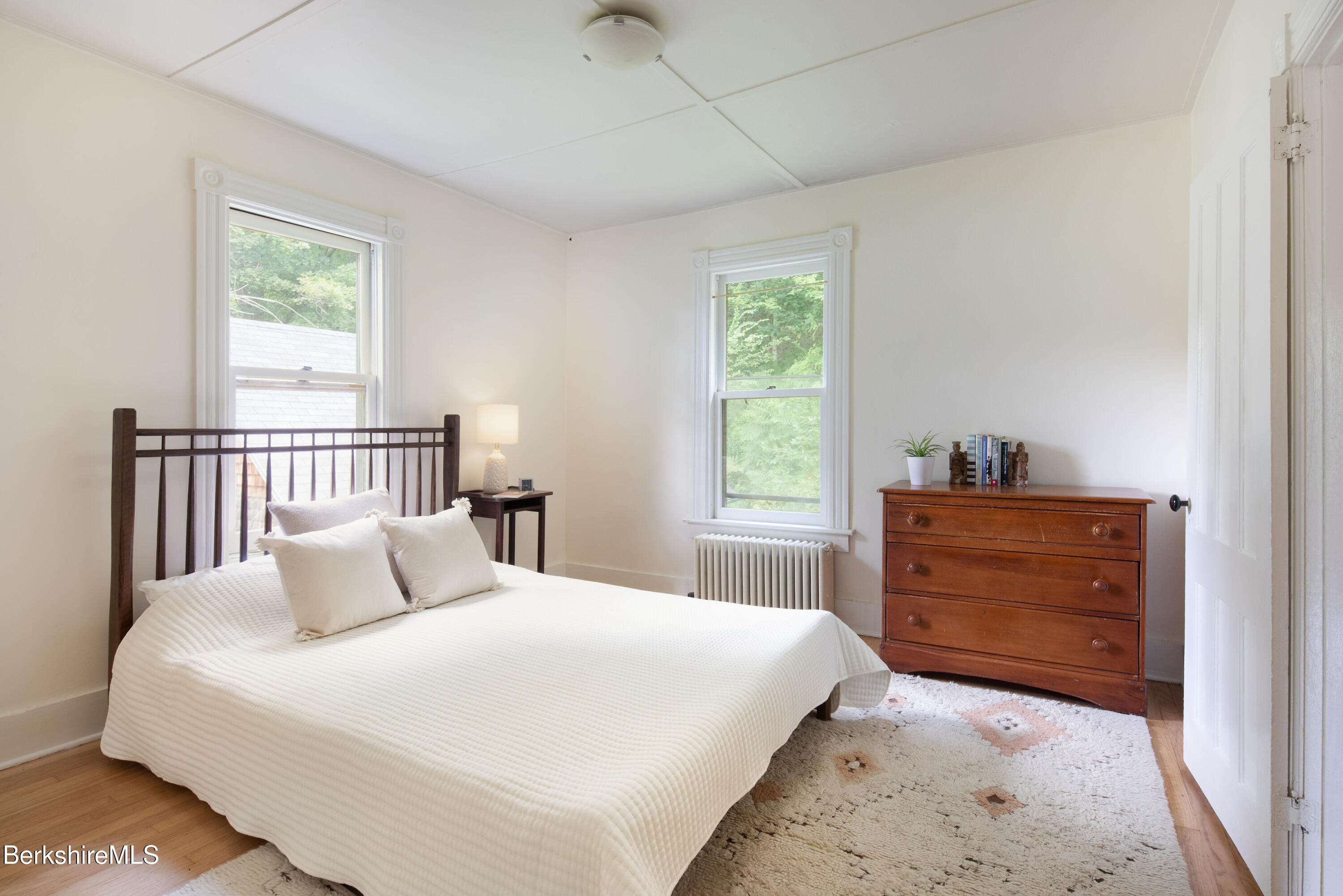 77 Grove Street Great Barrington, MA 01230 - Photo 22 of 31 a bedroom with a bed and a window