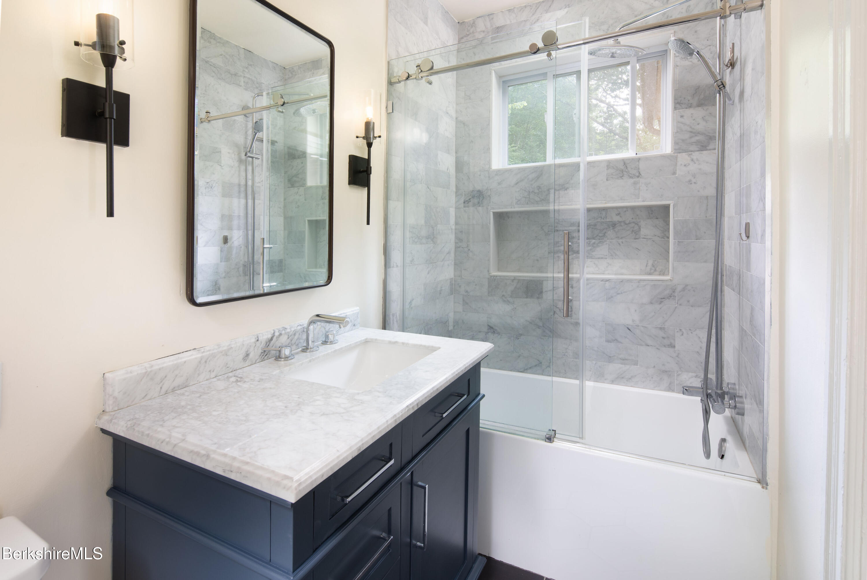 77 Grove Street Great Barrington, MA 01230 - Photo 24 of 31 a bathroom with a sink and a mirror