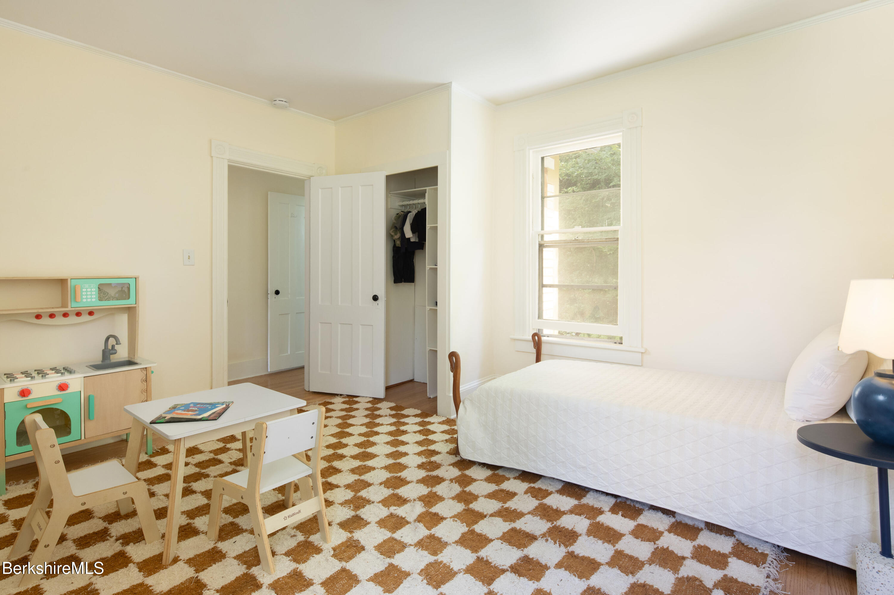 77 Grove Street Great Barrington, MA 01230 - Photo 27 of 31 a bedroom with a bed and a window