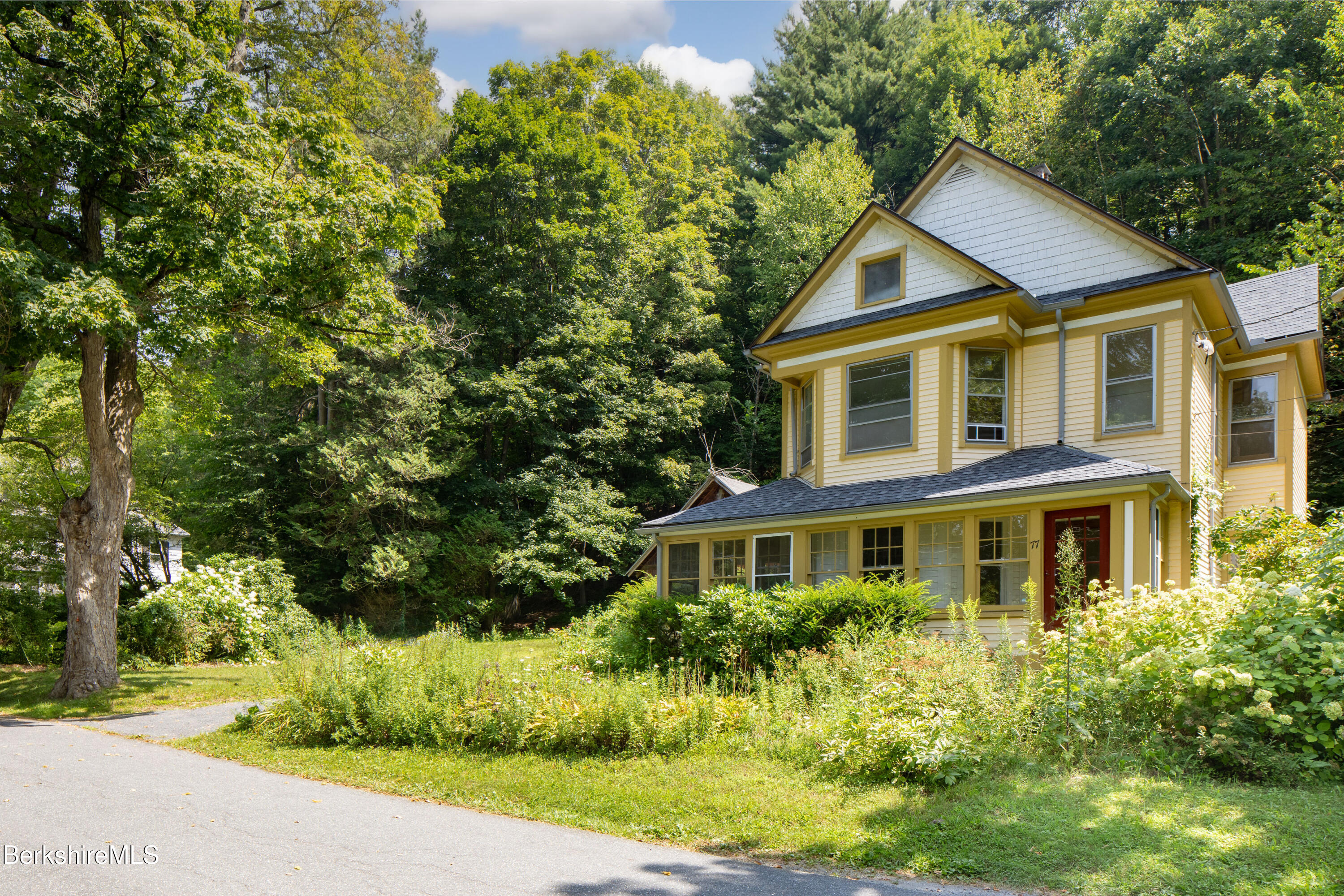 77 Grove Street Great Barrington, MA 01230 - Photo 3 of 31 a view of a yard in front of house