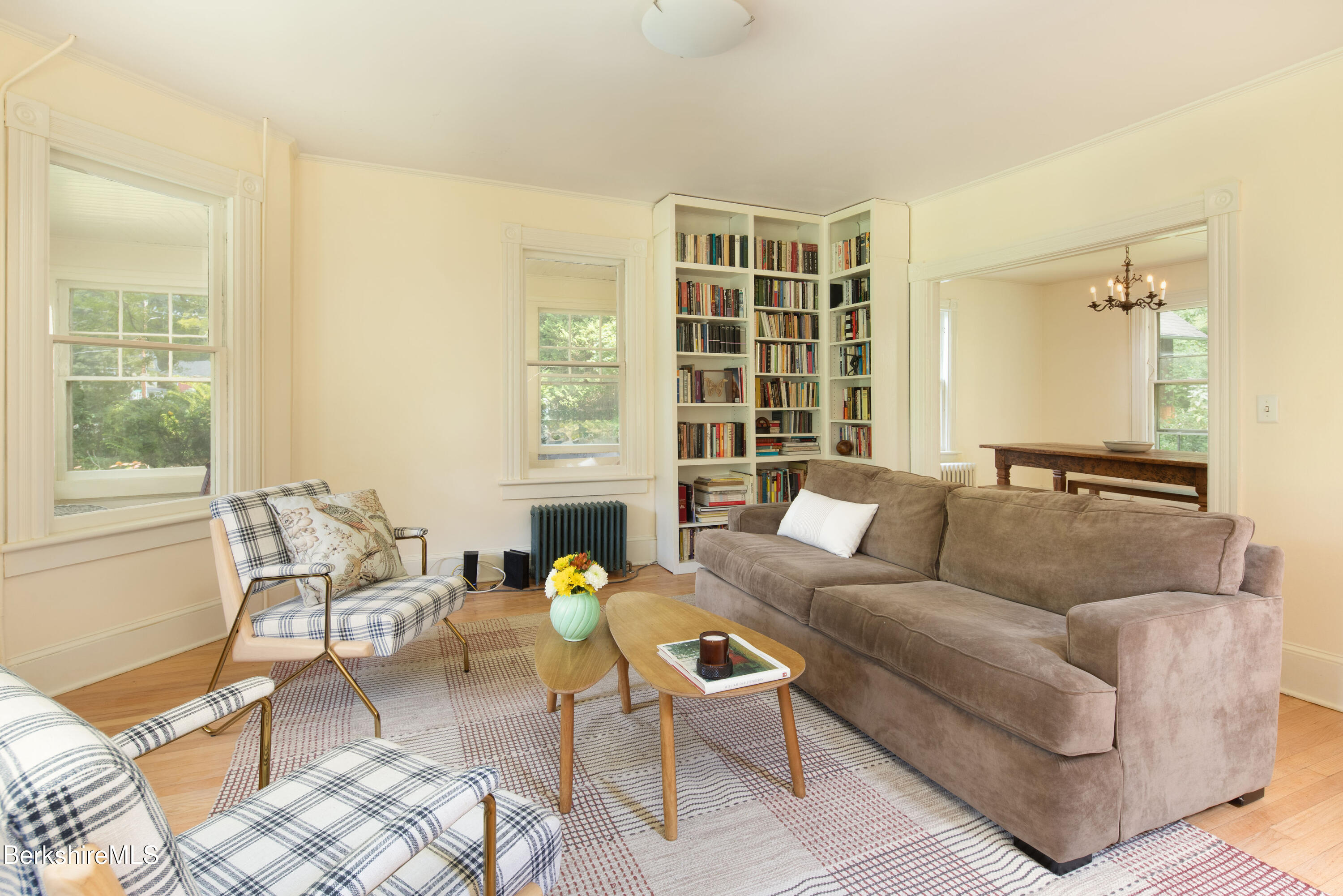 77 Grove Street Great Barrington, MA 01230 - Photo 6 of 31 a living room with furniture and a large window