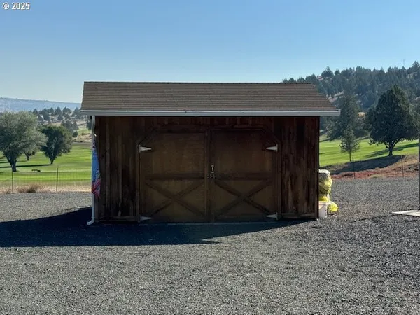 a view of a town with mountains in the background
