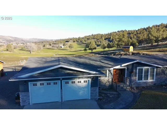 a black and white photo of a living room