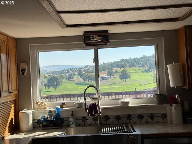 a kitchen with granite countertop lots of counter top space