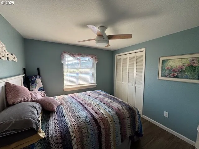 a bathroom with shower a sink and a mirror