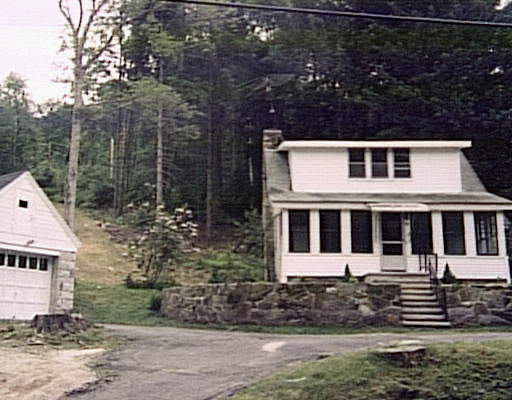 12 Upper Hampden Road Monson, MA 01057 - Photo 1 of 1 front view of a house with a yard