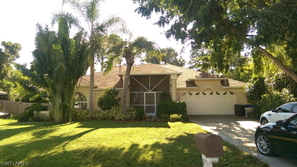17501 Butler Road Fort Myers, FL 33967 - Photo 1 of 20 a view of a house with backyard