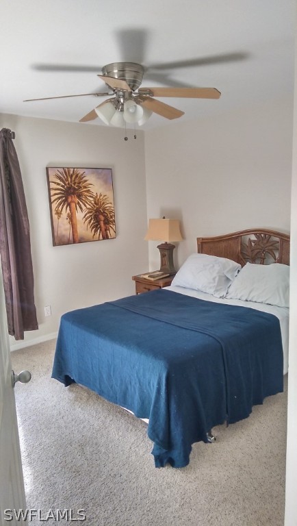 17501 Butler Road Fort Myers, FL 33967 - Photo 11 of 20 a bedroom with a bed and a painting on the wall