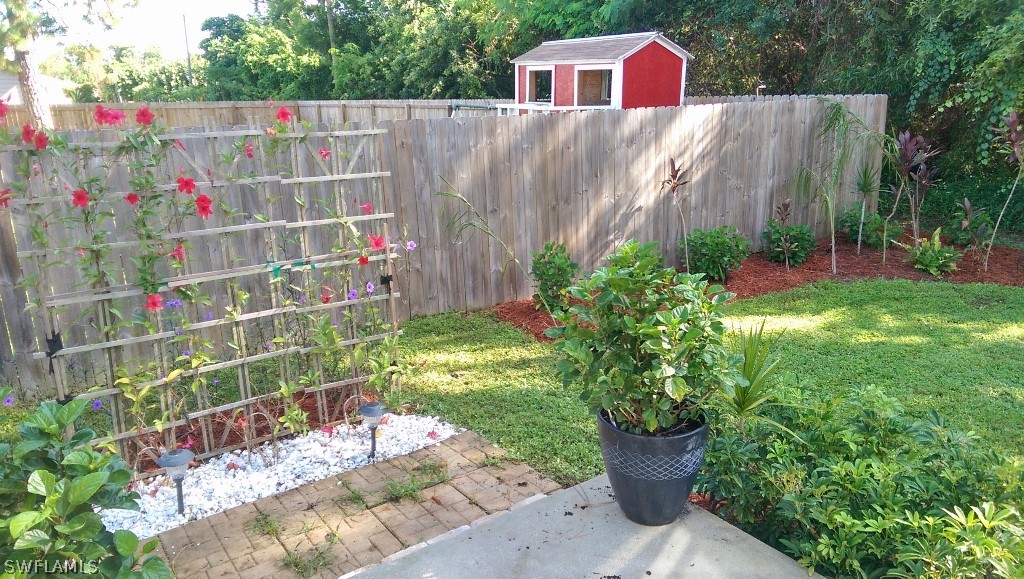 17501 Butler Road Fort Myers, FL 33967 - Photo 13 of 20 a view of a pathway with a small yard